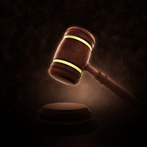 3D render of a gavel on a dramatic background